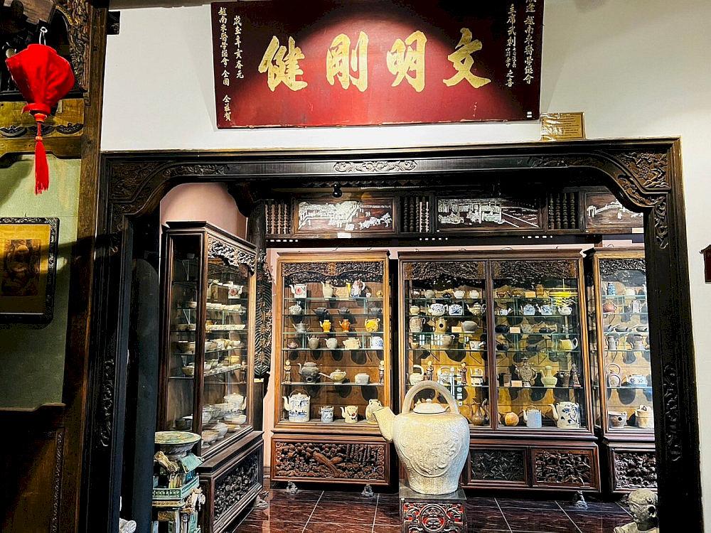 The exhibition room showcases teapots crafted in various regions across Vietnam